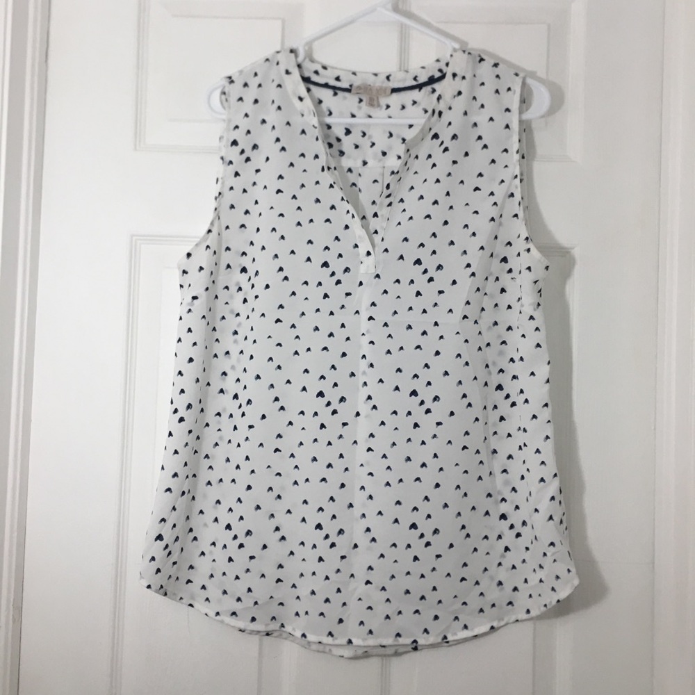 White top with blue hearts
